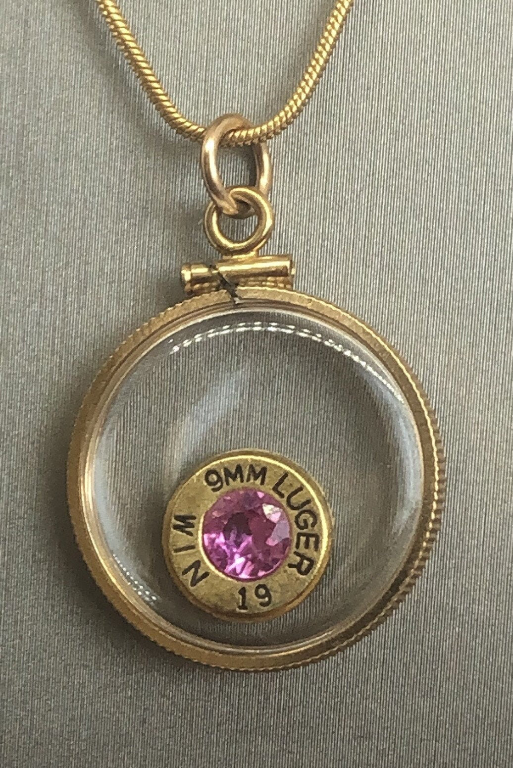 Handmade 9mm bullet w/Aquamarine or tourmaline , back to back view locket, 14k gold filled locket-new with floating faceted gem.