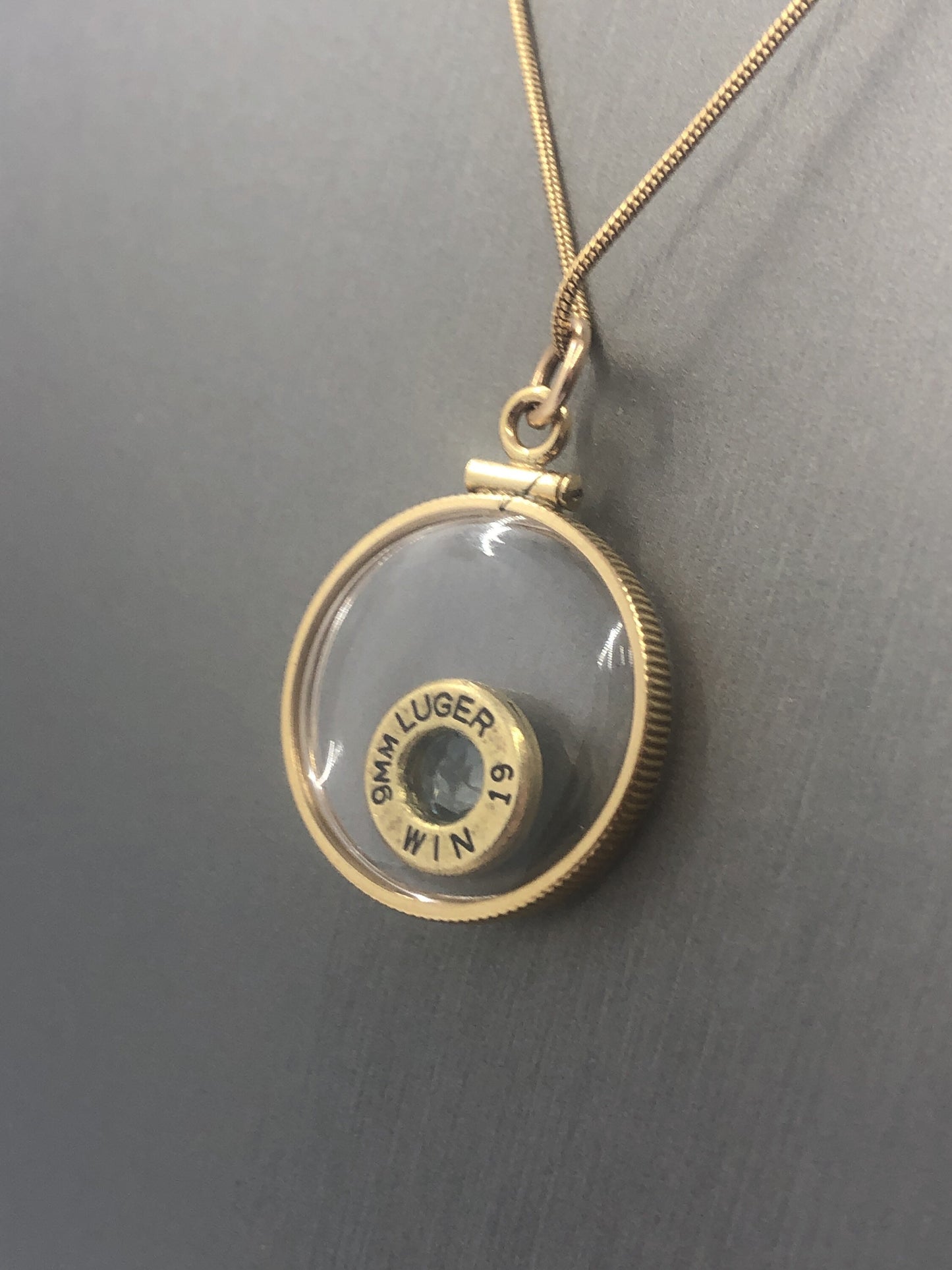Handmade 9mm bullet w/Aquamarine or tourmaline , back to back view locket, 14k gold filled locket-new with floating faceted gem.