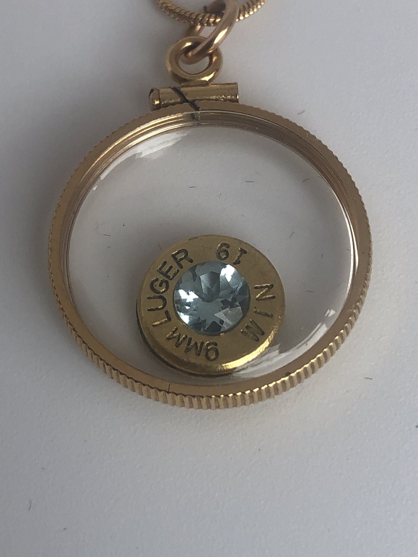 Handmade 9mm bullet w/Aquamarine or tourmaline , back to back view locket, 14k gold filled locket-new with floating faceted gem.