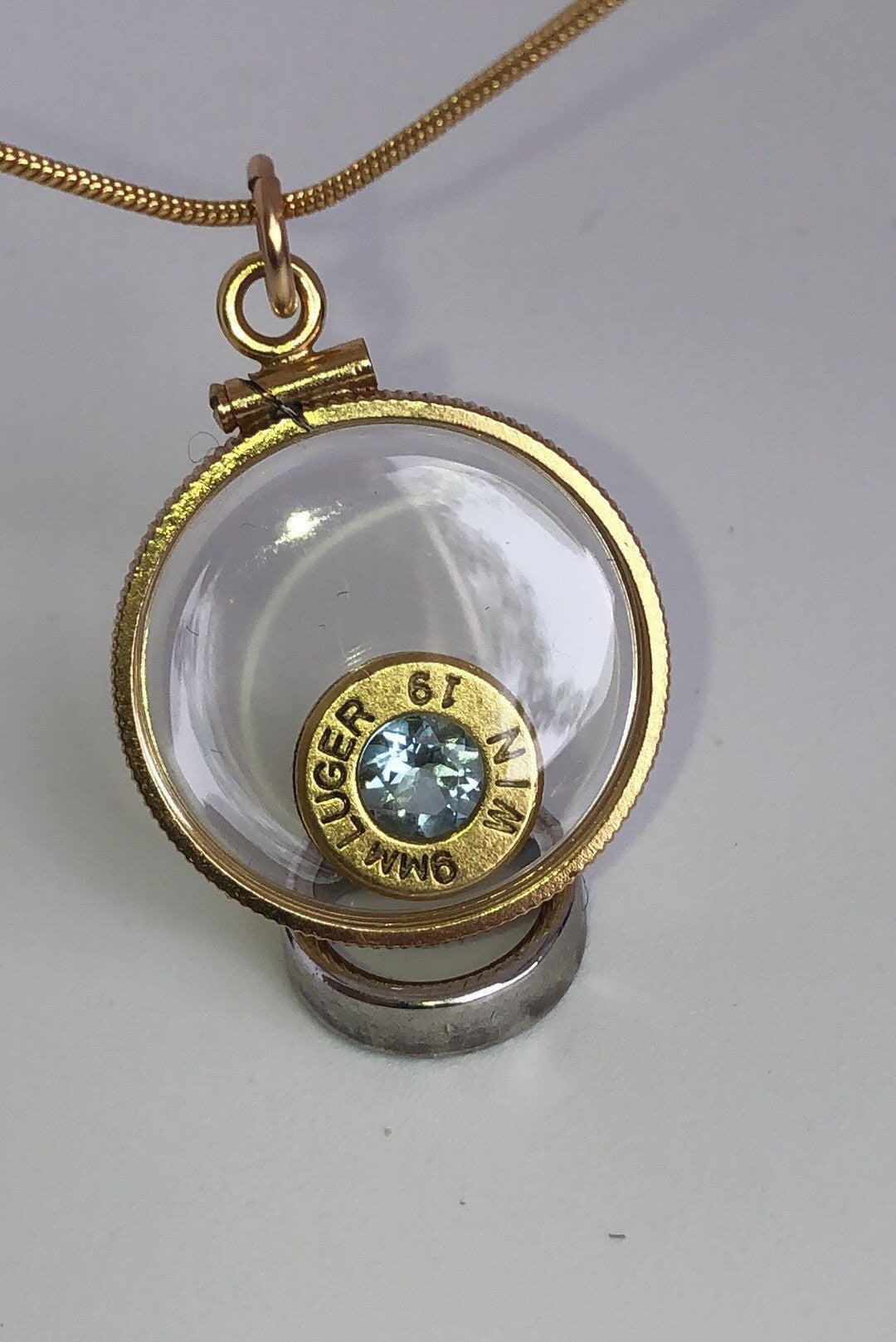 Handmade 9mm bullet w/Aquamarine or tourmaline , back to back view locket, 14k gold filled locket-new with floating faceted gem.