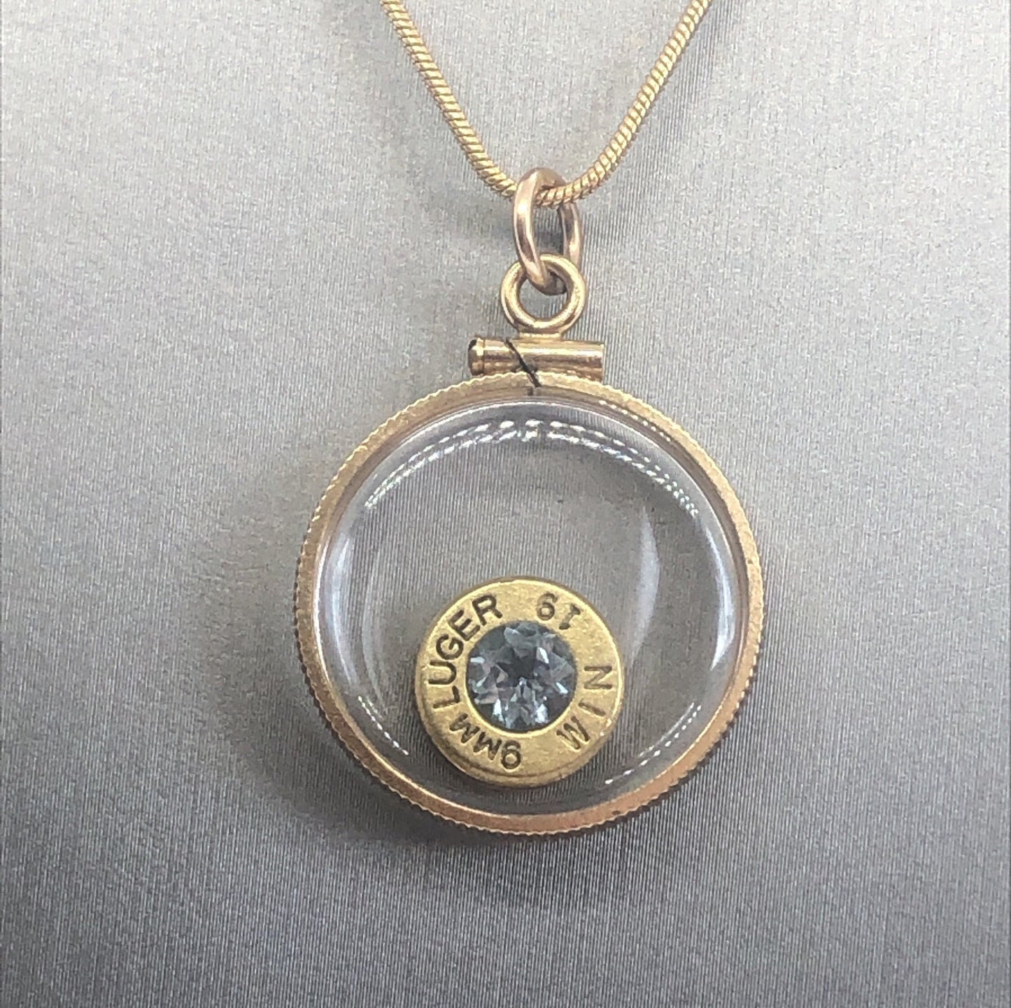 Handmade 9mm bullet w/Aquamarine or tourmaline , back to back view locket, 14k gold filled locket-new with floating faceted gem.