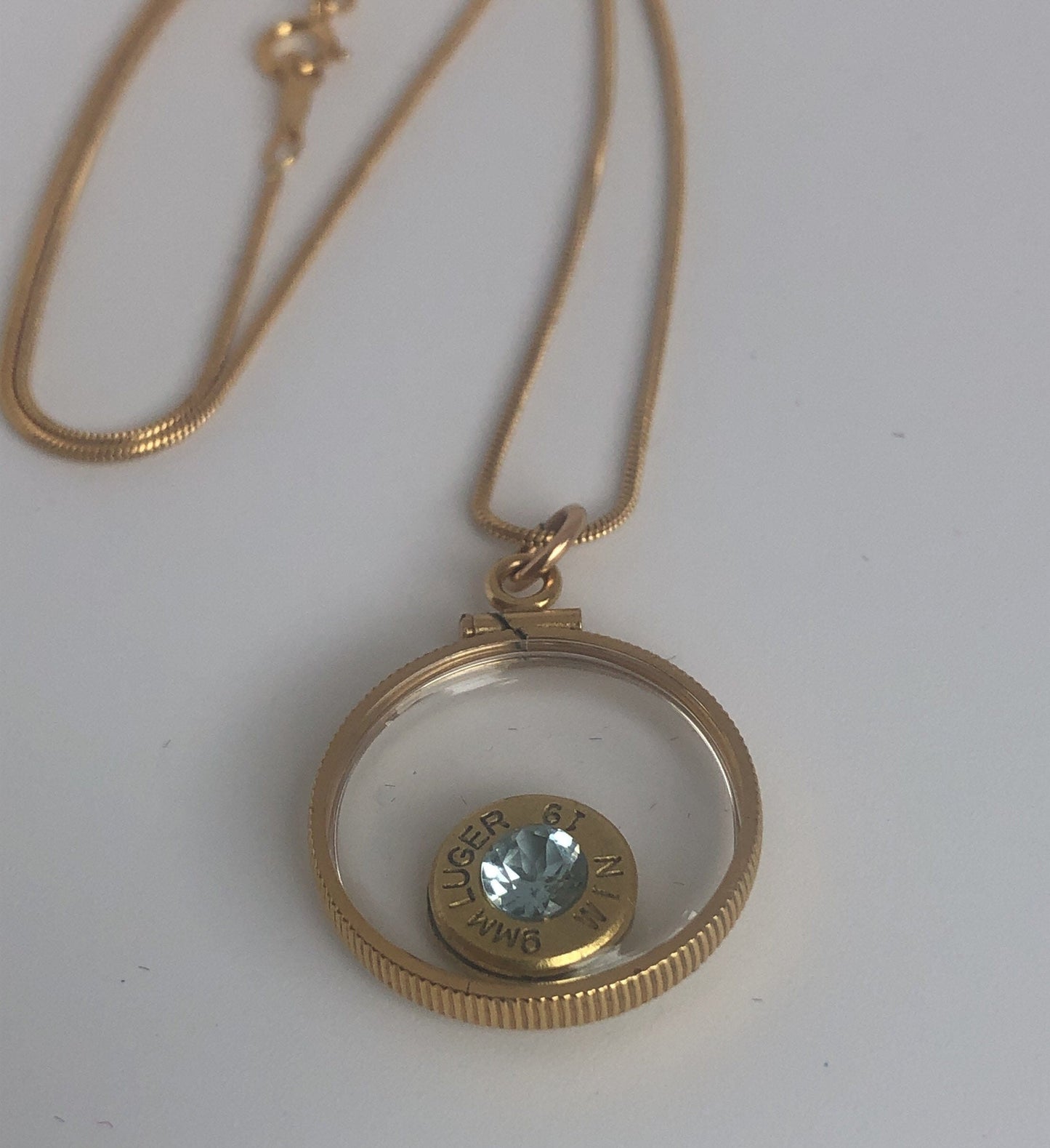 Handmade 9mm bullet w/Aquamarine or tourmaline , back to back view locket, 14k gold filled locket-new with floating faceted gem.