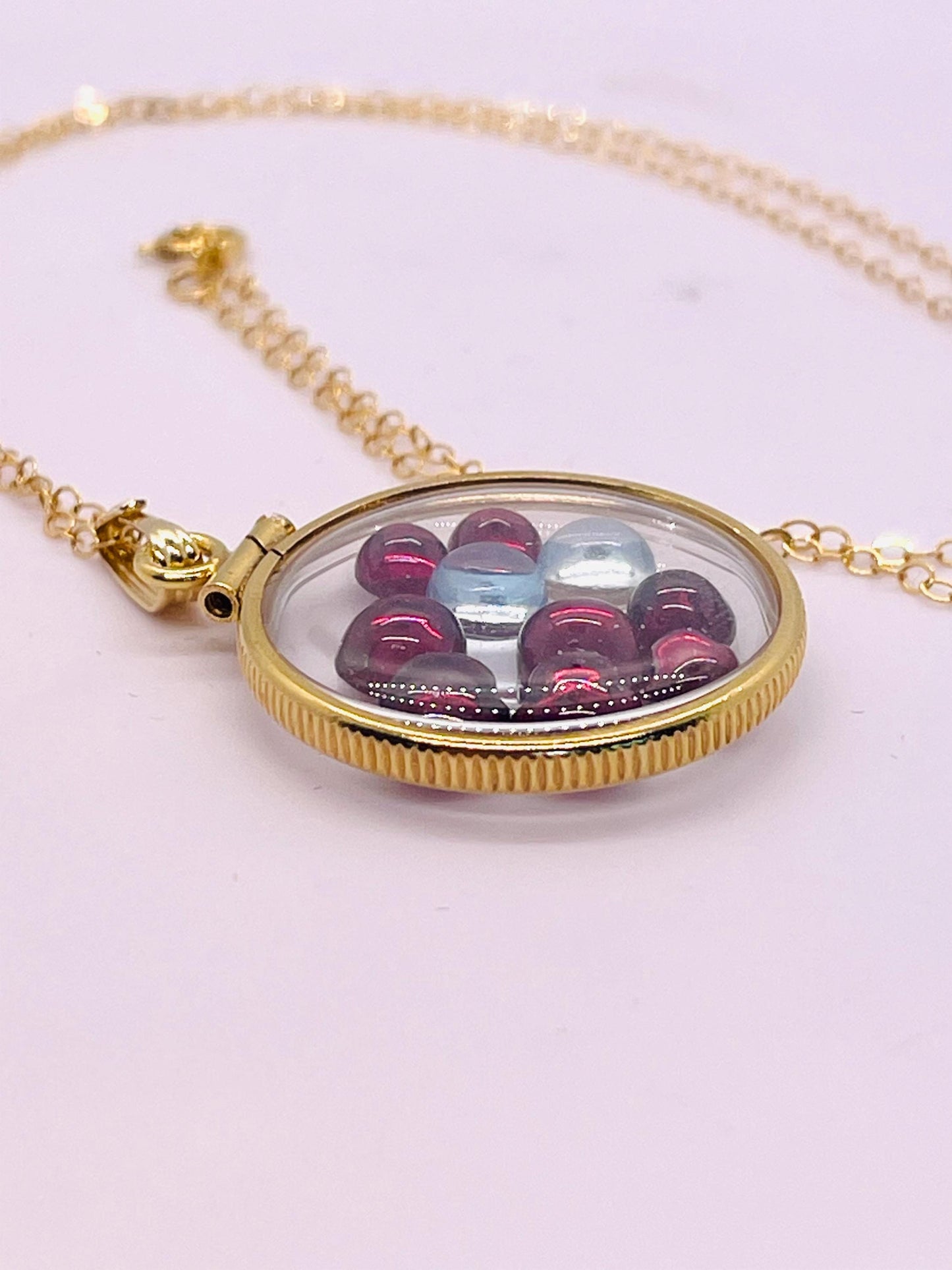 14k Solid Gold 22 mm Handmade Shaker Locket Filled With Garnet And White Topaz