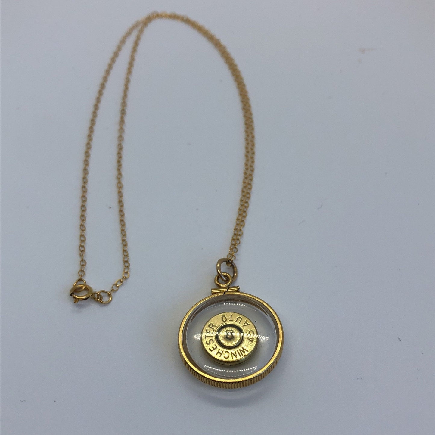 Winchester 45 cal. bullet necklace, back to back view locket, 14k gold filled locket, February birthstone