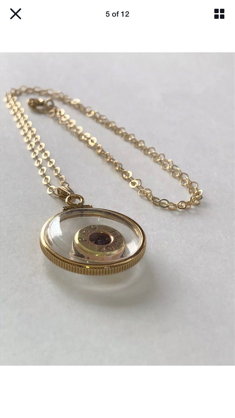 40 cal bullet necklace with floating amethyst Vintage 12k gold filled locket