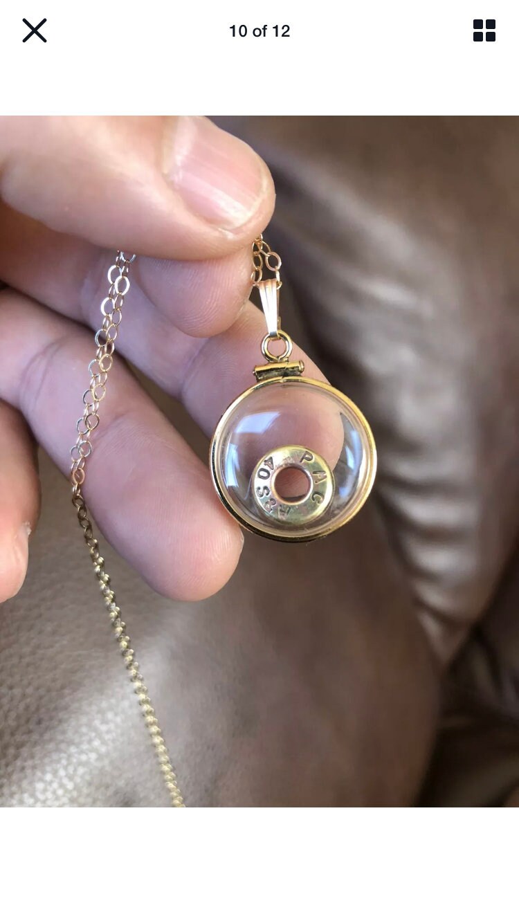 40 cal bullet necklace with floating amethyst Vintage 12k gold filled locket