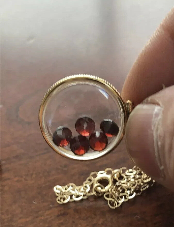 20mm Vintage 12k gold filled Shaker locket with five floating genuine Garnets