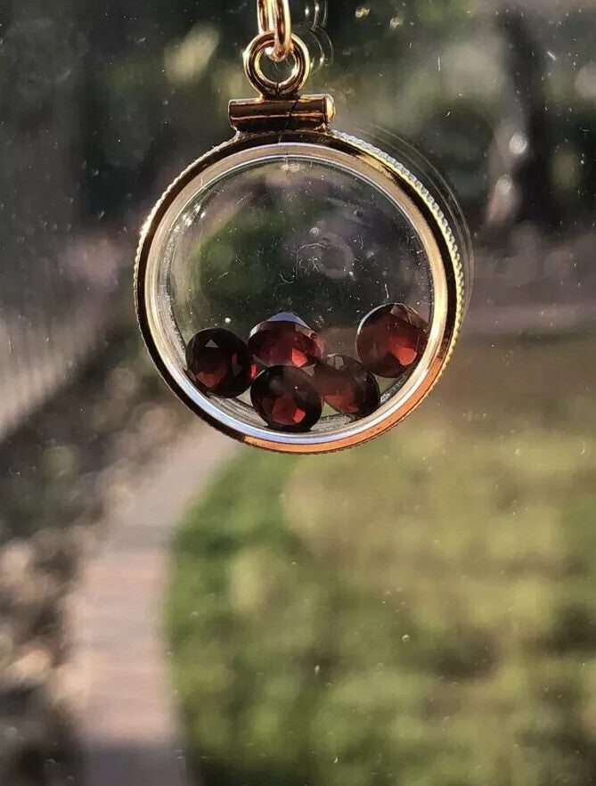 20mm Vintage 12k gold filled Shaker locket with five floating genuine Garnets
