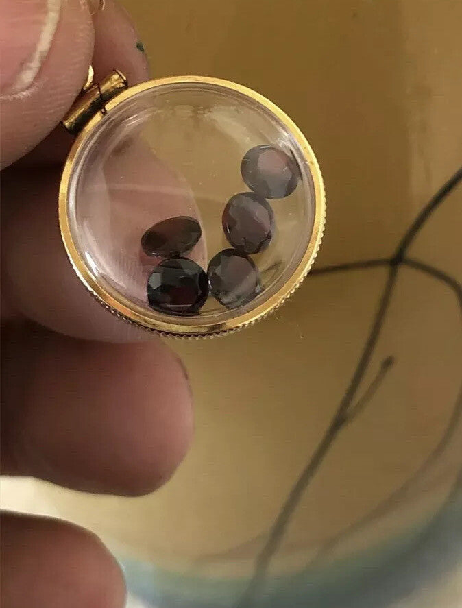 20mm Vintage 12k gold filled Shaker locket with five floating genuine Garnets