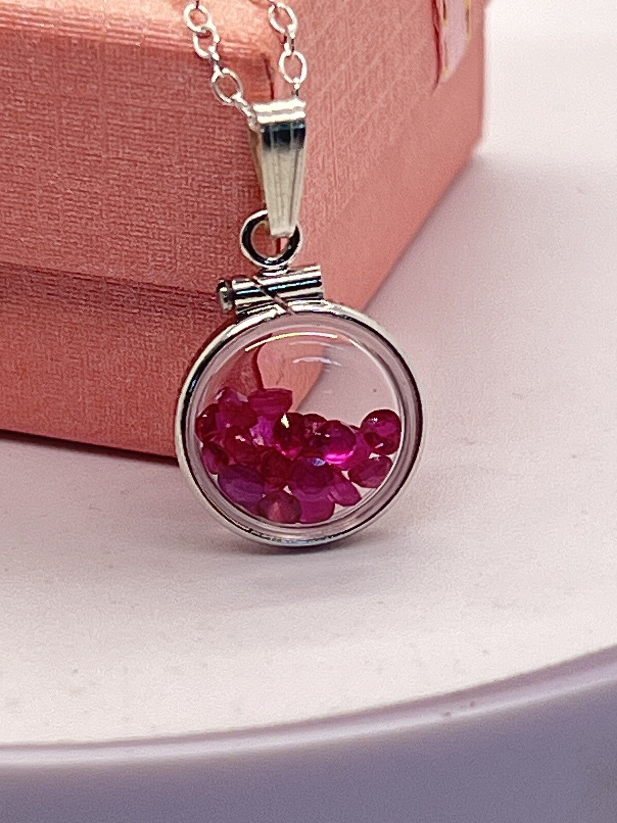 Diminutive Silver Ruby Shaker Locket Lucite, JULY Birthstone. 1.65 TCW round cut