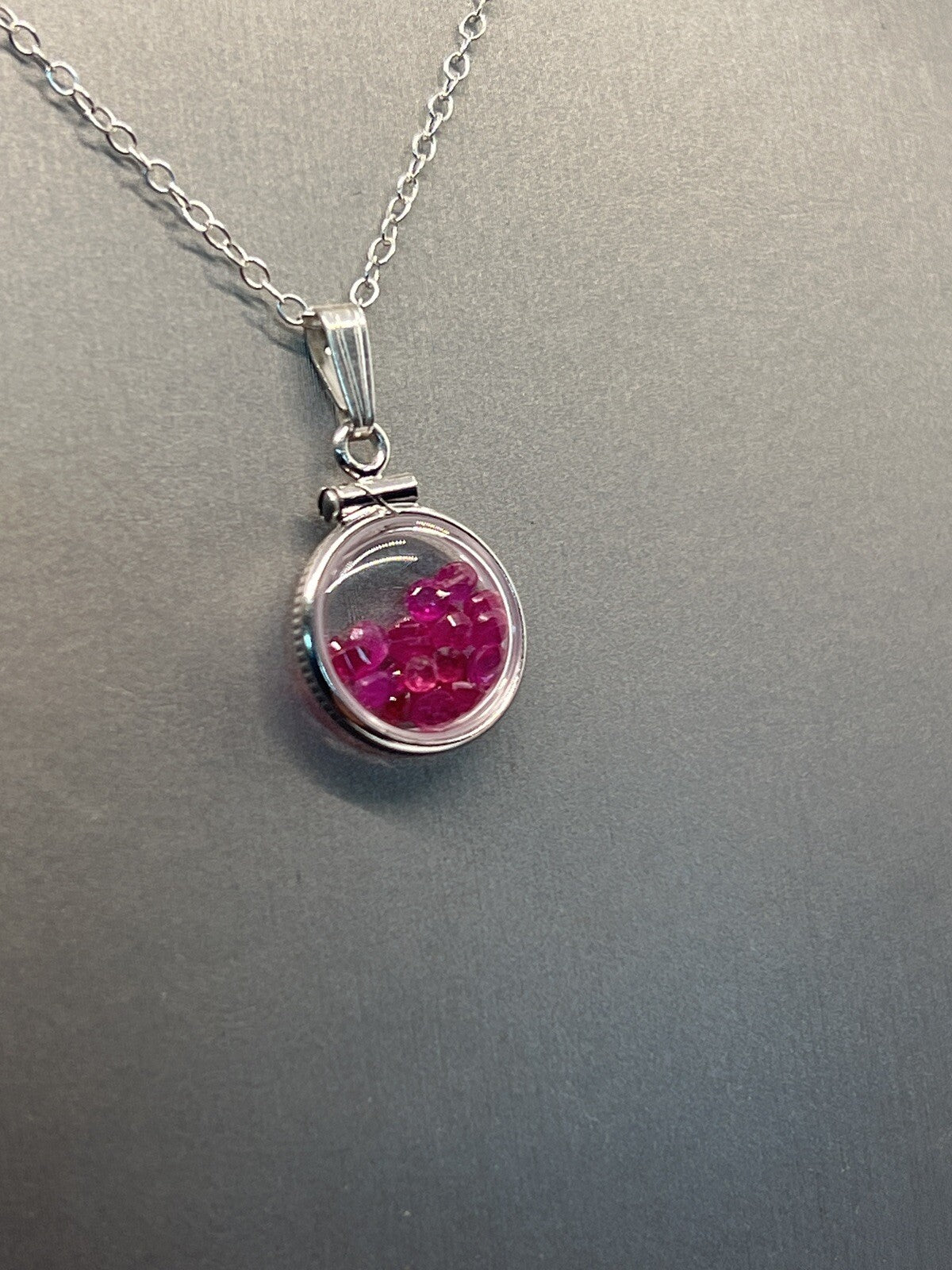 Diminutive Silver Ruby Shaker Locket Lucite, JULY Birthstone. 1.65 TCW round cut