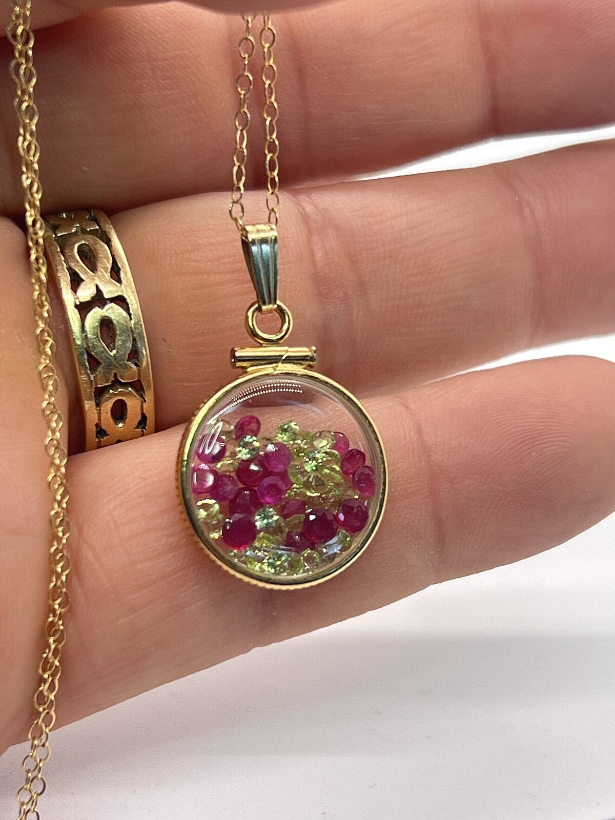 14k gold filled dime size Lucite Shaker Locket with Rubies and Peridot
