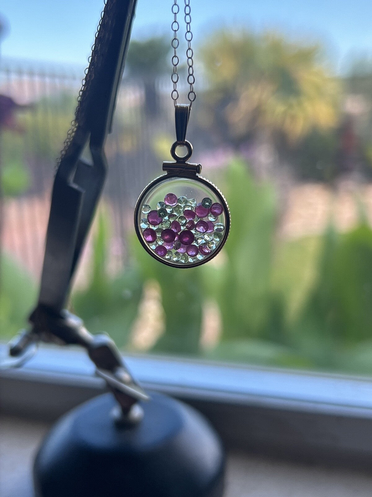 14k gold filled dime size Lucite Shaker Locket with Rubies and Peridot