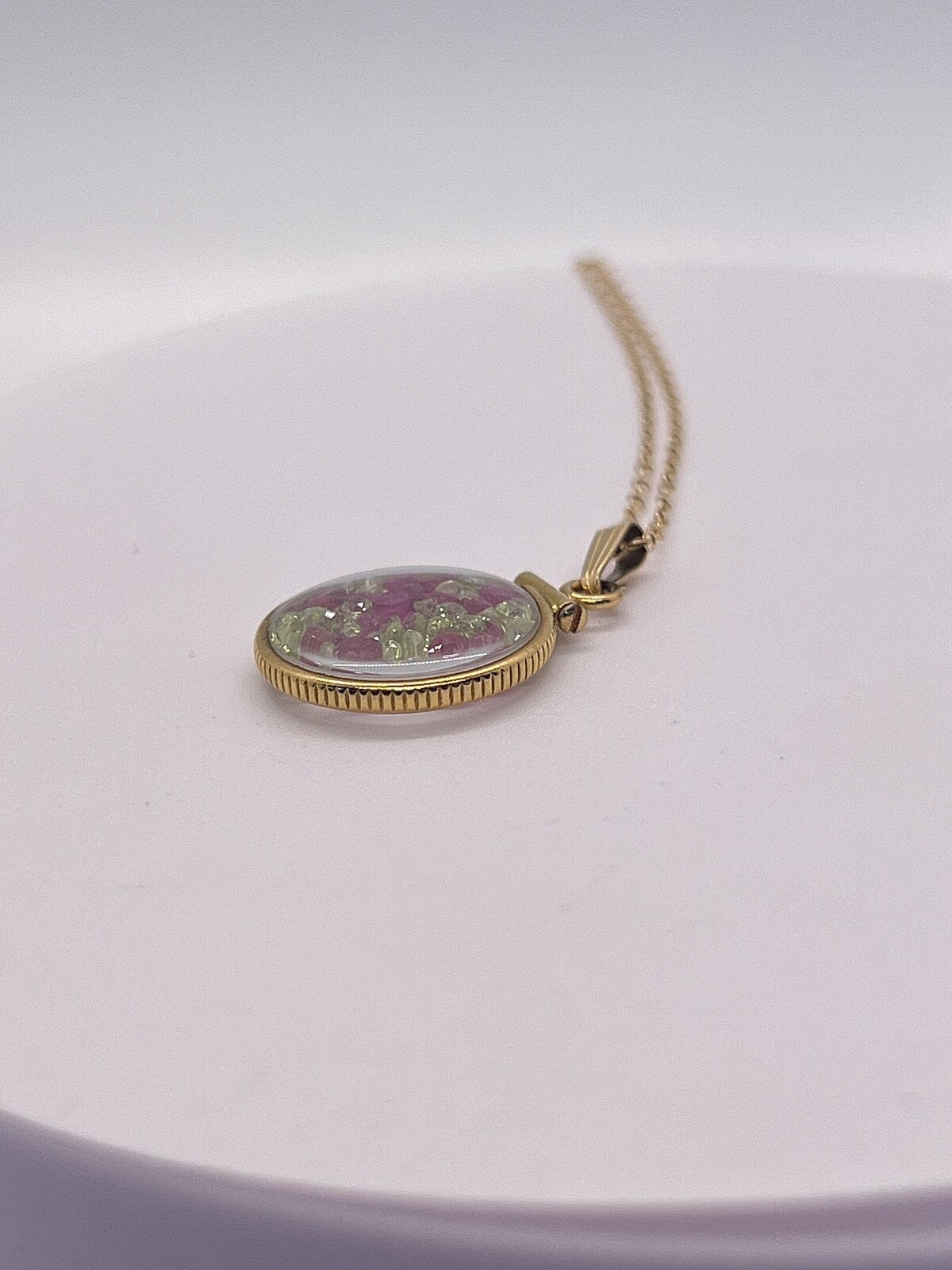 14k gold filled dime size Lucite Shaker Locket with Rubies and Peridot