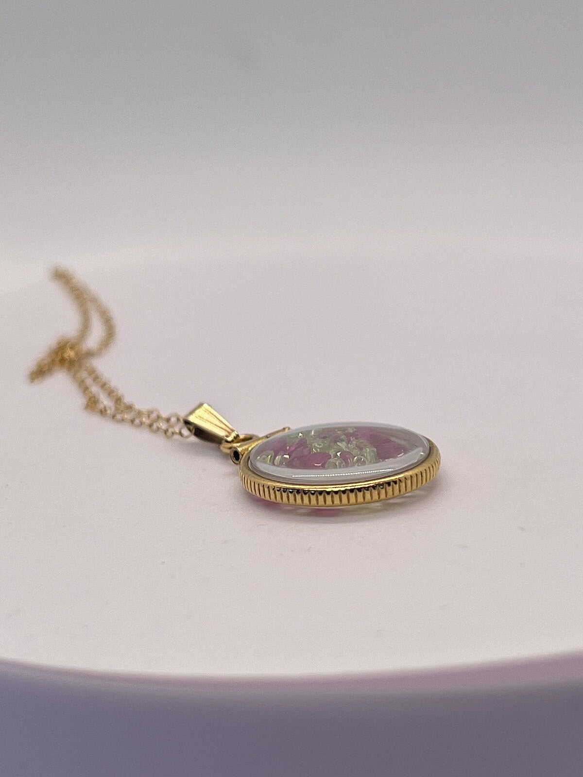14k gold filled dime size Lucite Shaker Locket with Rubies and Peridot