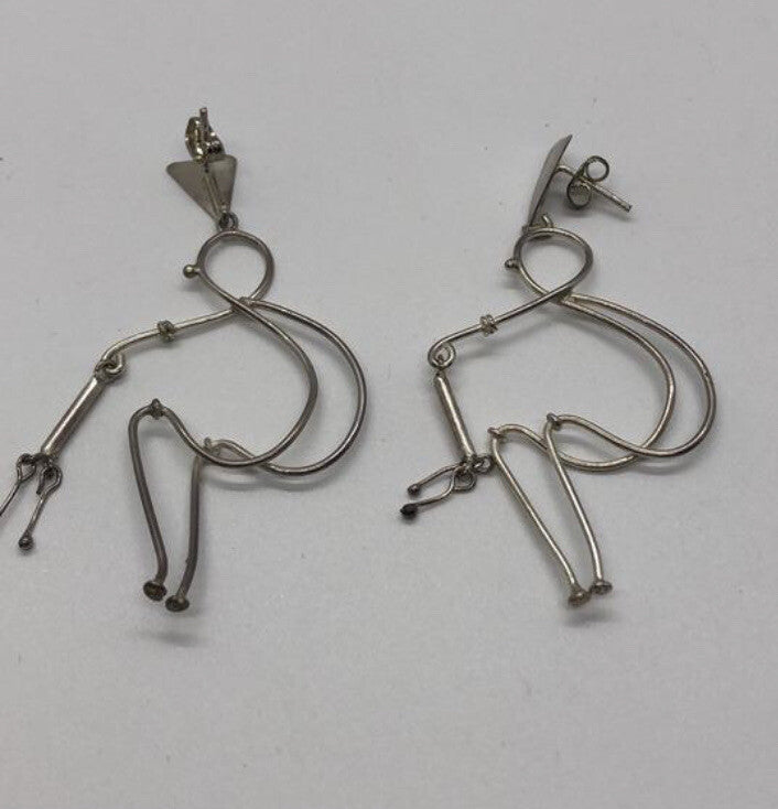Large handmade sterling silver earring, Indonesia, unique human form