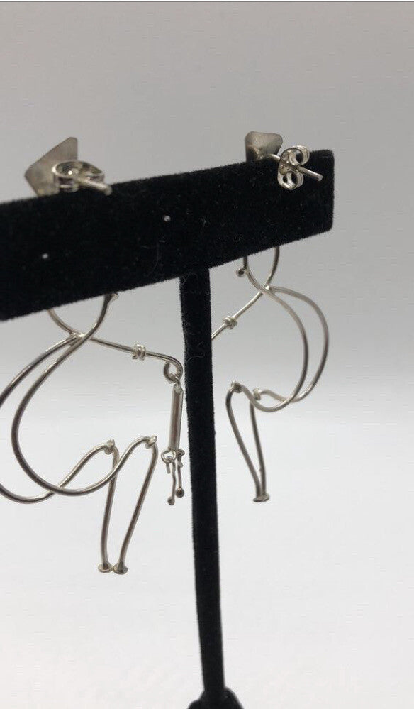 Large handmade sterling silver earring, Indonesia, unique human form