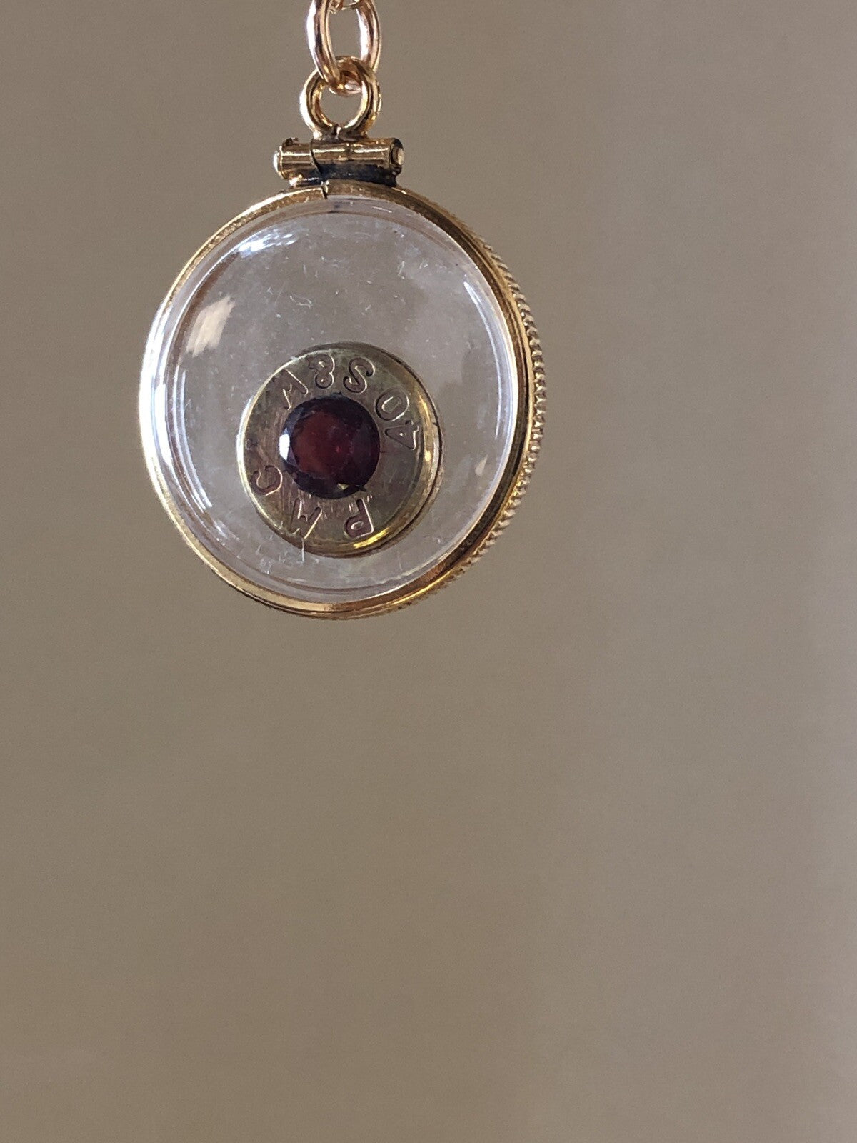 40 cal bullet necklace with 5 mm Garnet, Vintage 12k gold filled locket