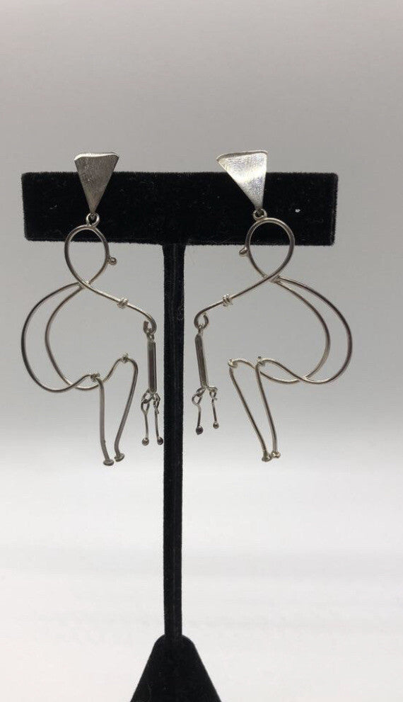 Large handmade sterling silver earring, Indonesia, unique human form