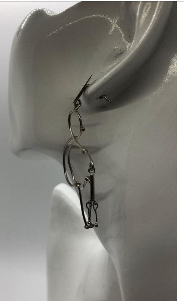 Large handmade sterling silver earring, Indonesia, unique human form