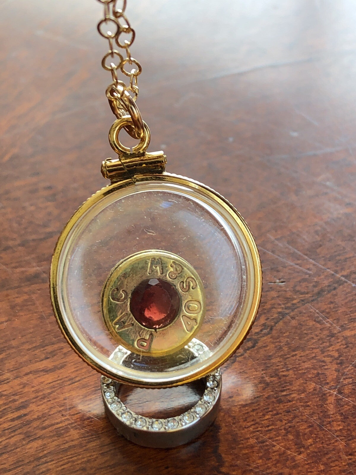 40 cal bullet necklace with 5 mm Garnet, Vintage 12k gold filled locket