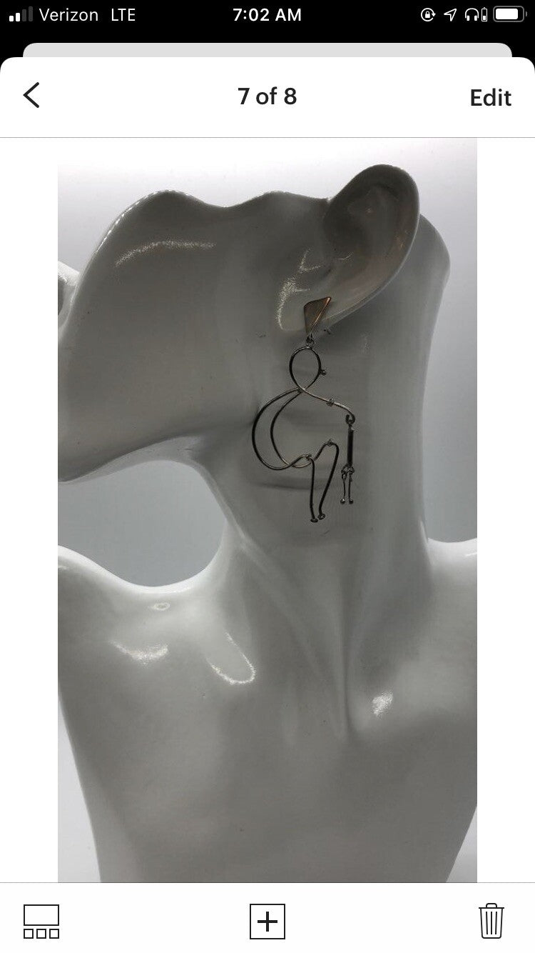Large handmade sterling silver earring, Indonesia, unique human form