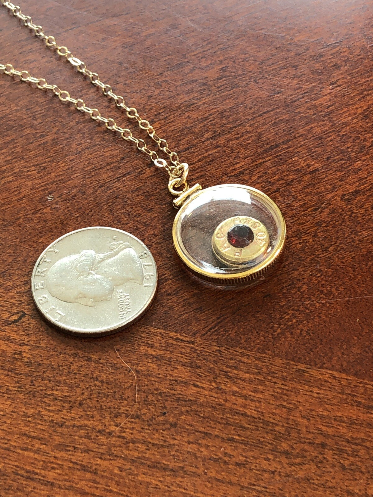 40 cal bullet necklace with 5 mm Garnet, Vintage 12k gold filled locket