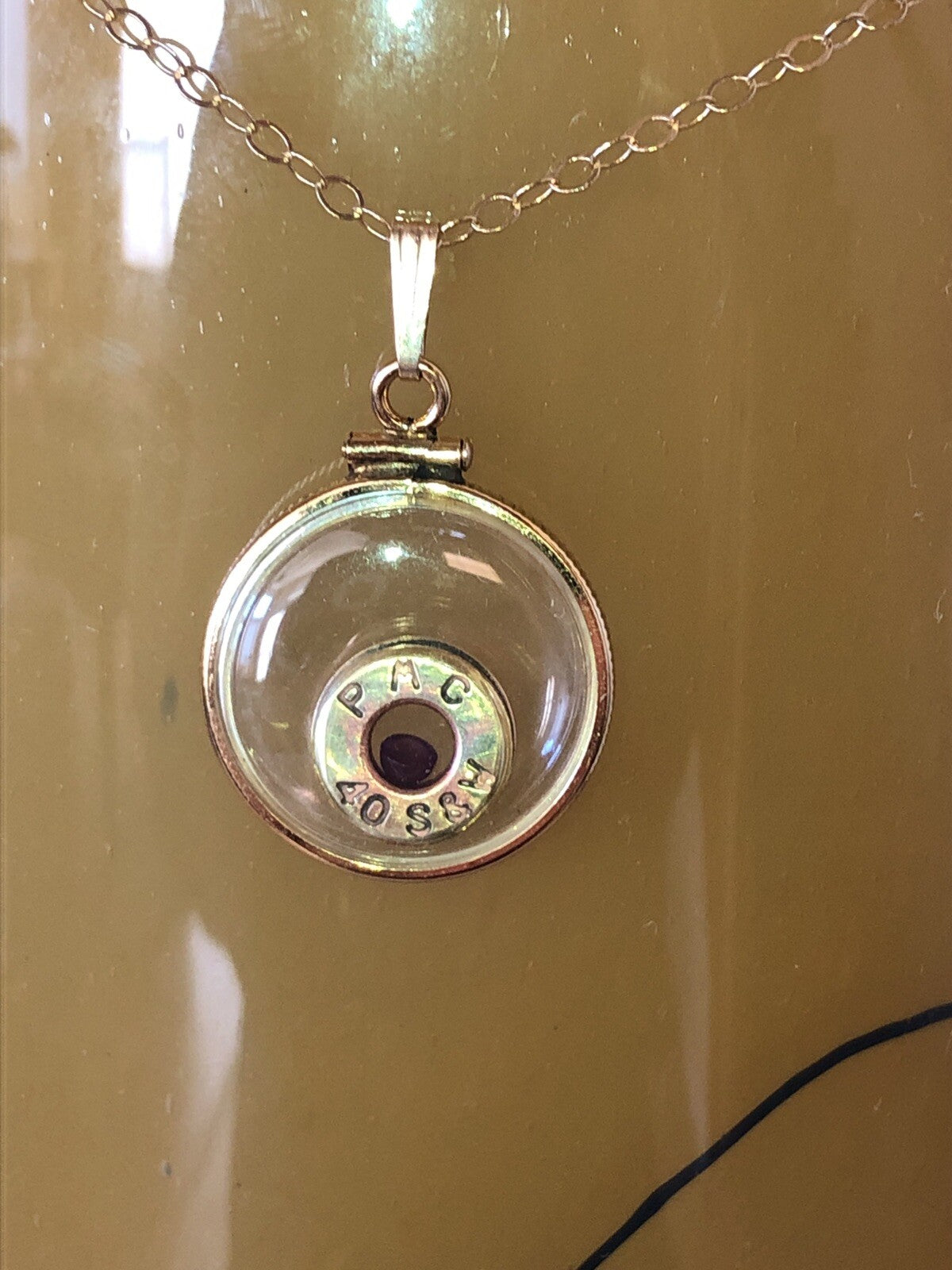 40 cal bullet necklace with floating amethyst Vintage 12k gold filled locket