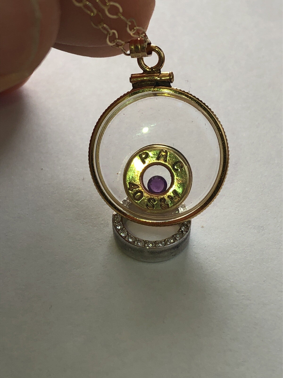 40 cal bullet necklace with floating amethyst Vintage 12k gold filled locket