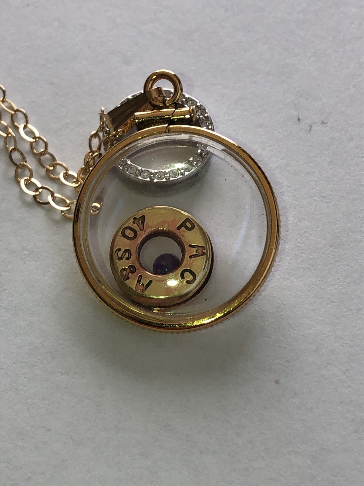 40 cal bullet necklace with floating amethyst Vintage 12k gold filled locket