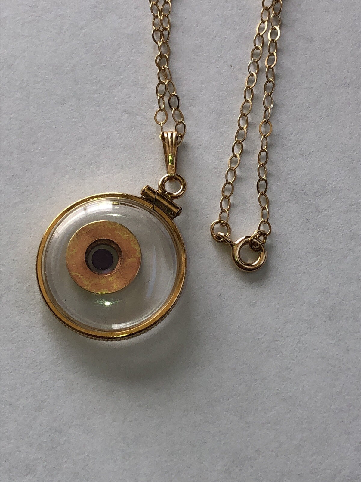 40 cal bullet necklace with floating amethyst Vintage 12k gold filled locket