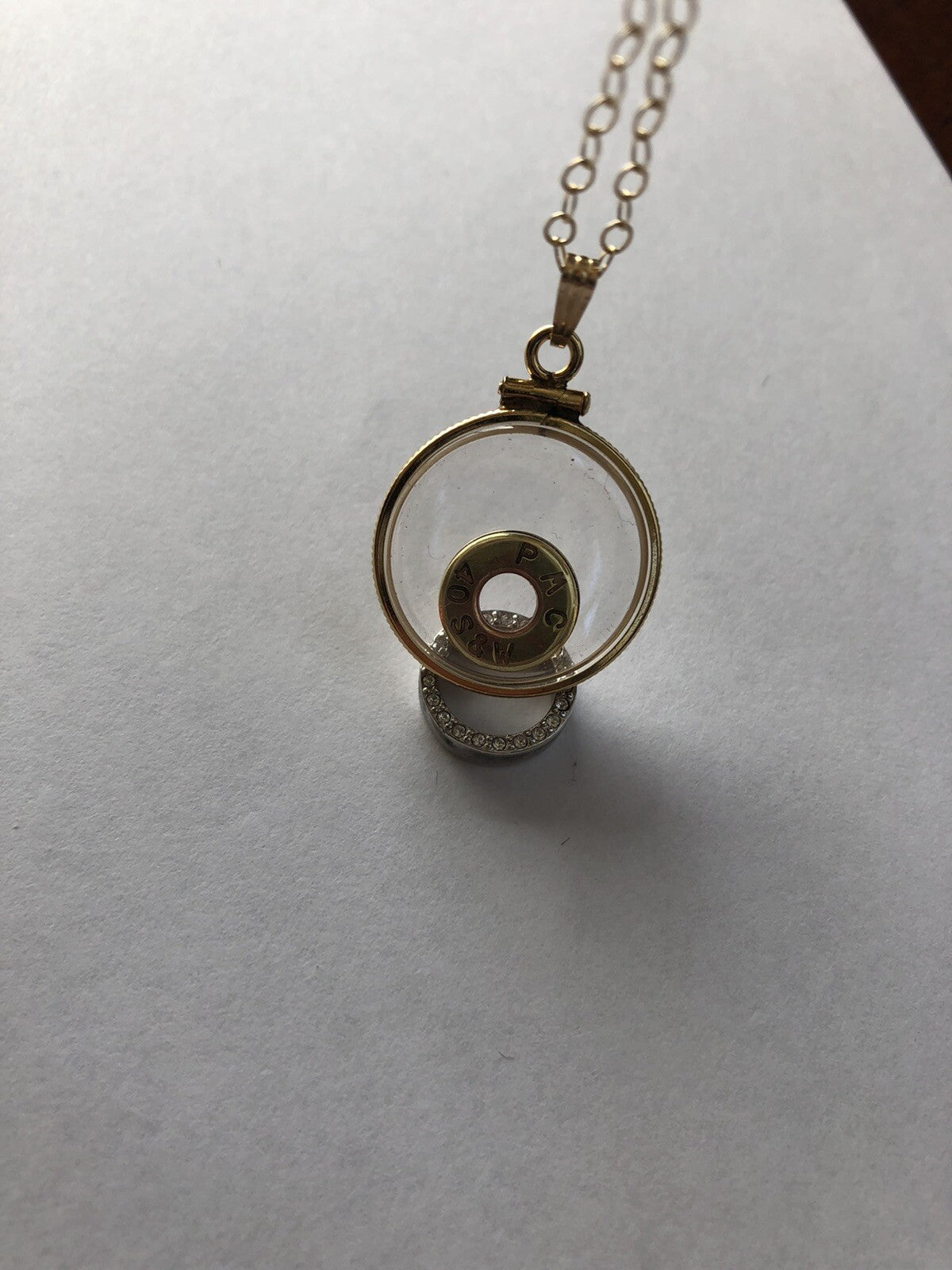 40 cal bullet necklace with floating amethyst Vintage 12k gold filled locket