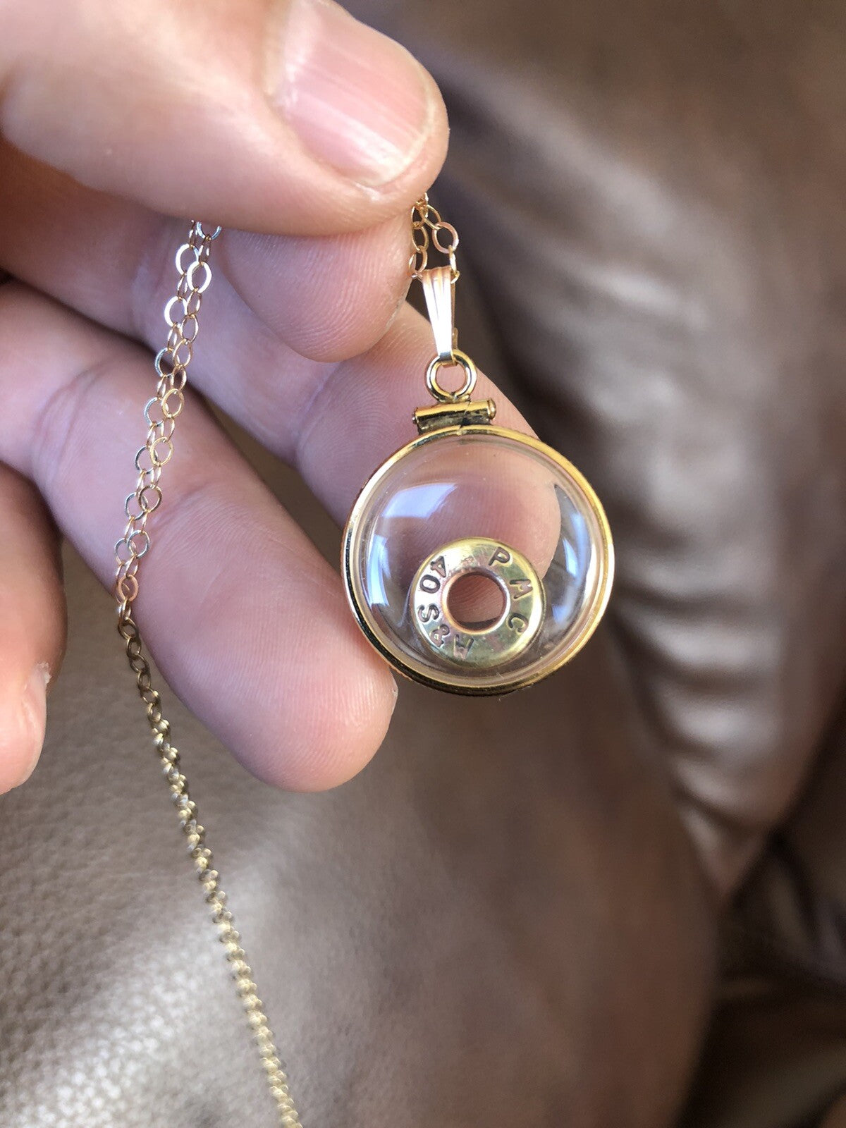 40 cal bullet necklace with floating amethyst Vintage 12k gold filled locket