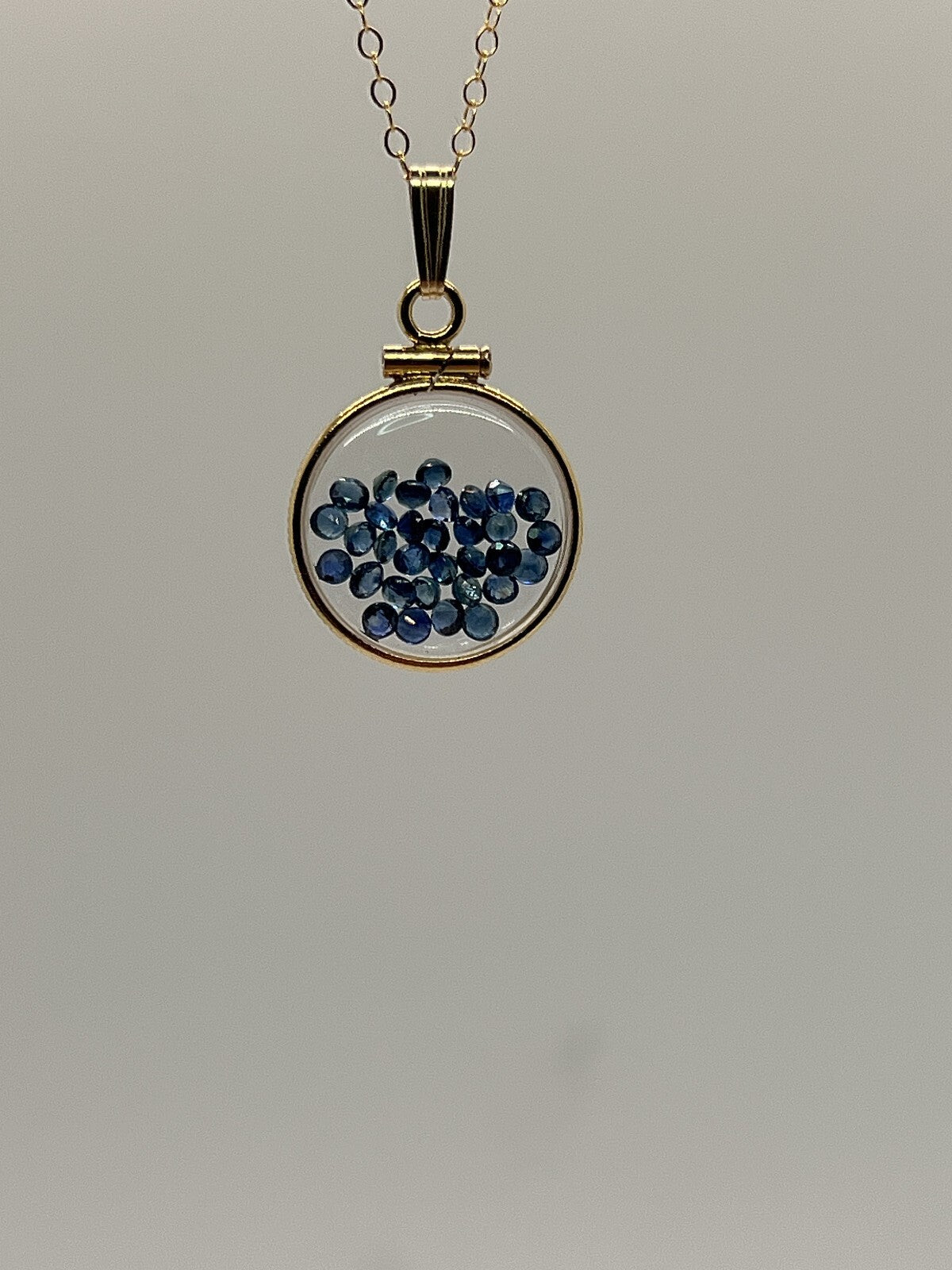 14k Solid gold dime size Lucite Shaker Locket w/ Sapphire, September birthstone