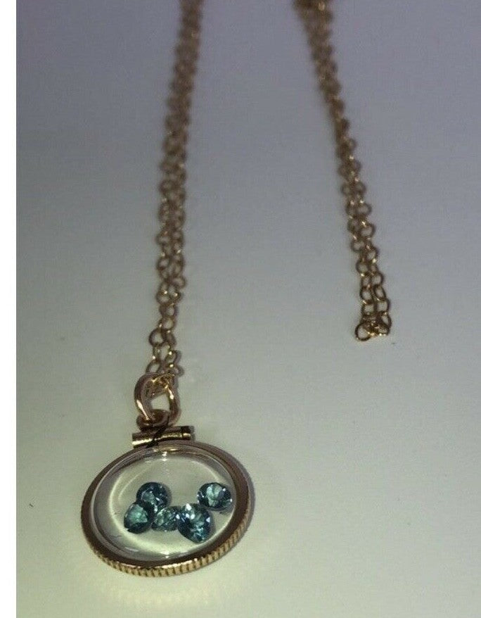 Vintage 12k gold filled shaker locket with five round cut 3mm Topaz gemstones