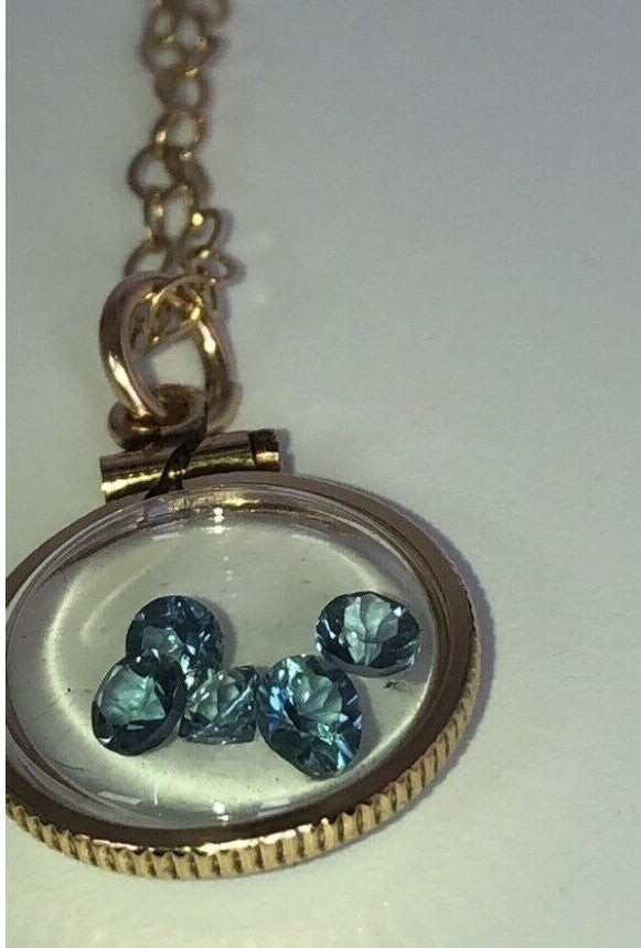 Vintage 12k gold filled shaker locket with five round cut 3mm Topaz gemstones