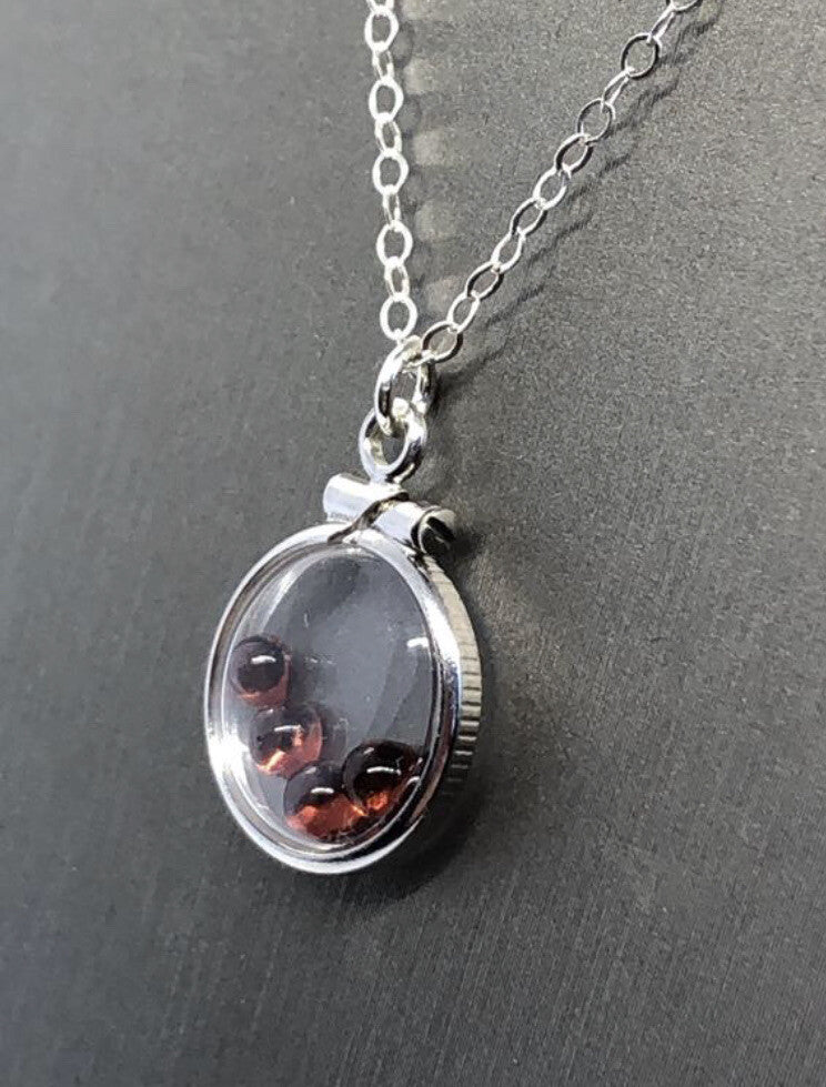 12.5 mm Handmade sterling silver shaker locket with 0.85 TCW of genuine garnets