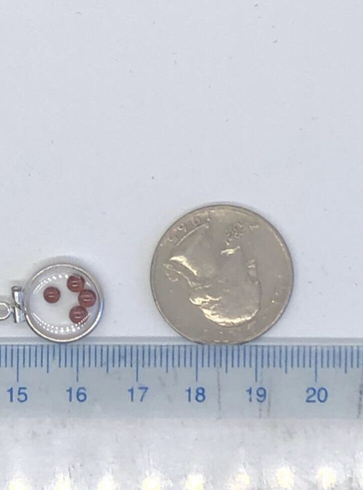12.5 mm Handmade sterling silver shaker locket with 0.85 TCW of genuine garnets