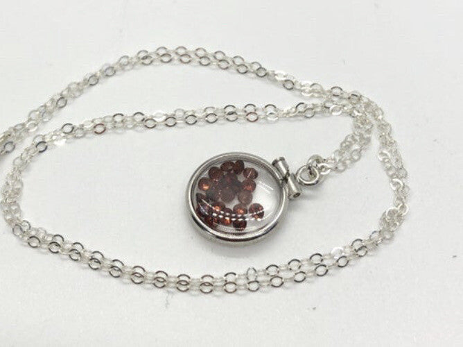 12.5 mm Handmade sterling silver shaker locket with 0.85 TCW of genuine garnets