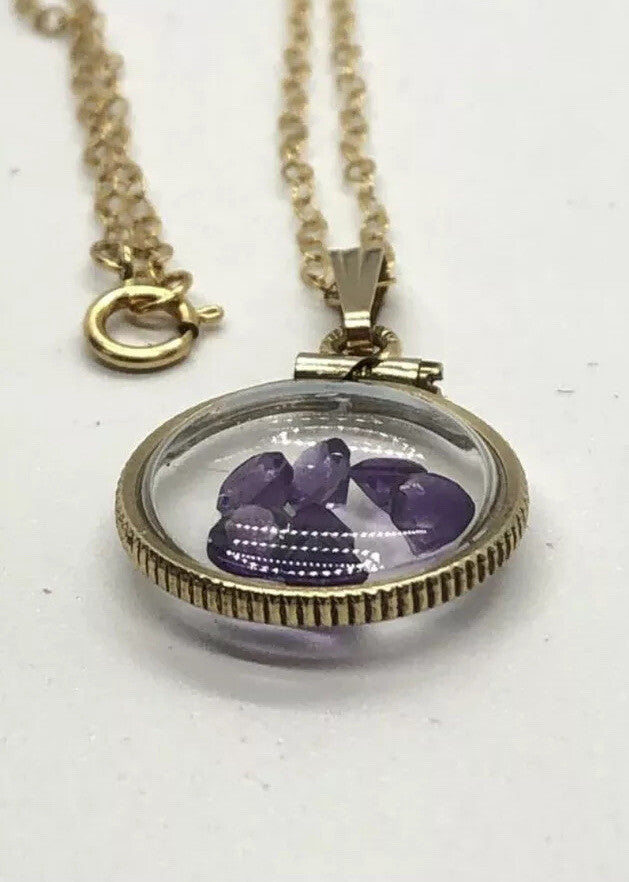15 mm Vintage 12k gold filled locket with 7 ,3mm beautiful cut amethyst 0.7 tcw