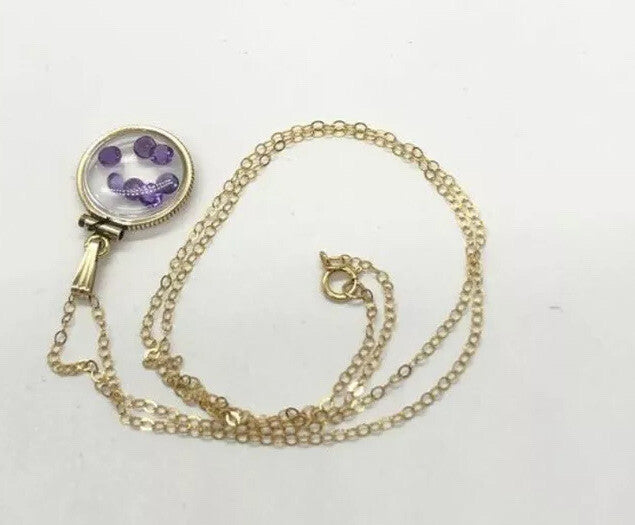 15 mm Vintage 12k gold filled locket with 7 ,3mm beautiful cut amethyst 0.7 tcw