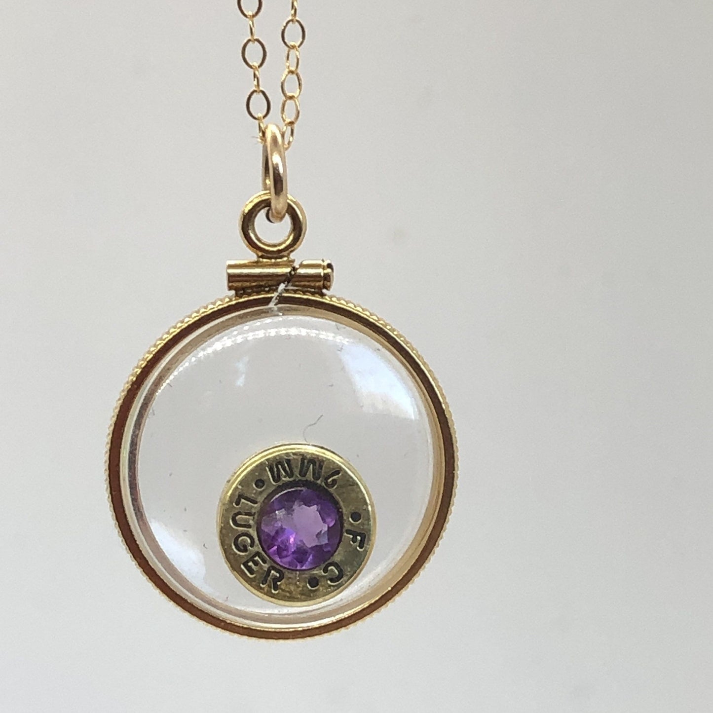 Handmade 14k gold filled 9 mm bullet view locket, finished with a 0.5 CT, 5mm genuine Amethyst gemstone, February birthday