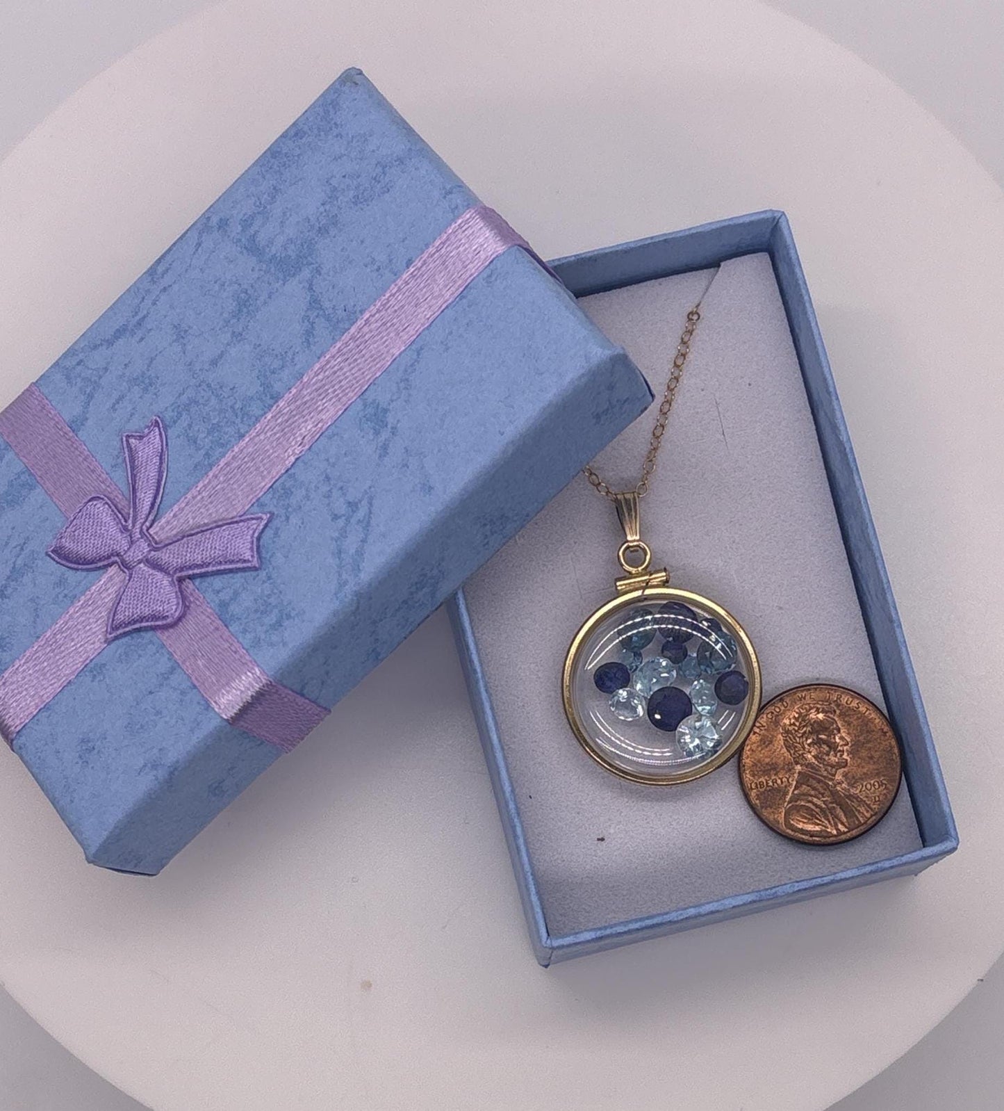 14k Solid Gold 22 mm Handmade Shaker Locket Filled with 6cttw. Sappire, London Blue Topaz, Sky Blue Topaz.
