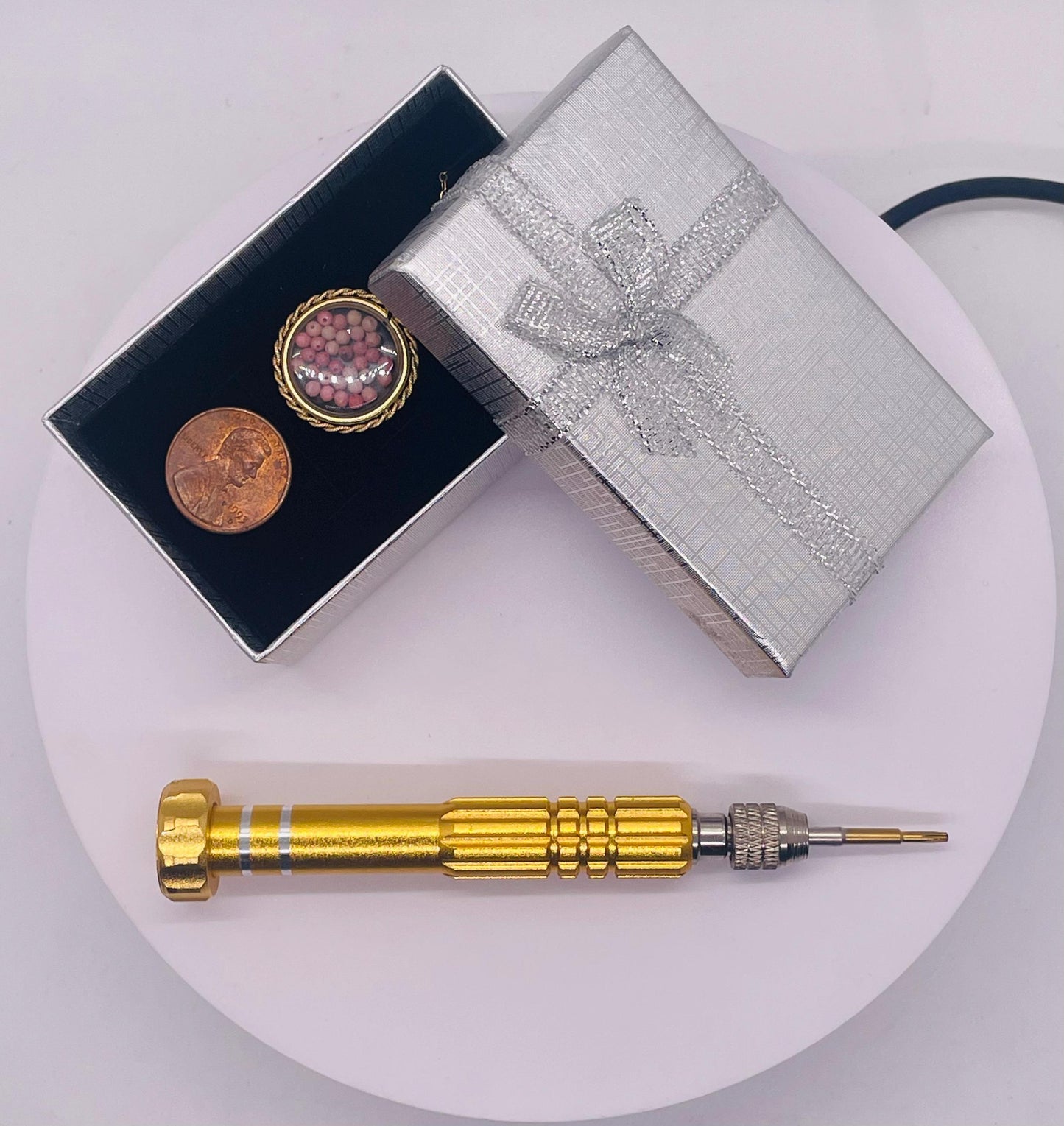 Hand made 21 mm nickel size 14k gold filled lucite genuine rhodonite shaker locket with rope edge and beautiful bead crystals.