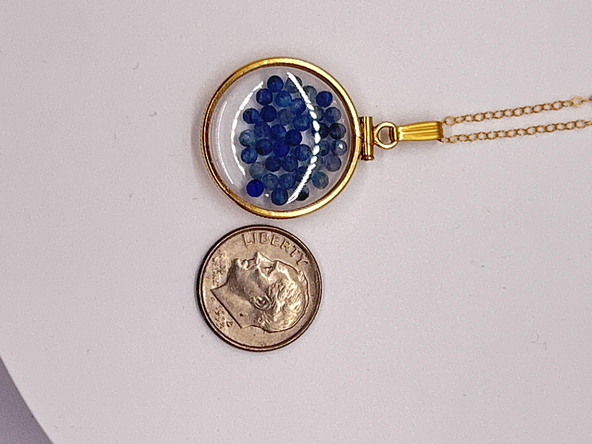 Solid 14k gold lucite 22mm kyanite bead shaker locket with microfaceted 2.5mm beautiful beads. natural gem beads.