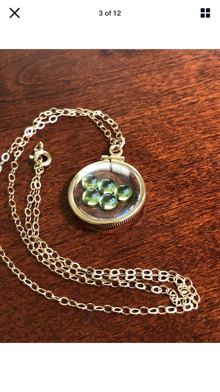Vintage 12k gold filled locket with five 5mm beautiful green peridot cabochons, 3.26 TCW
