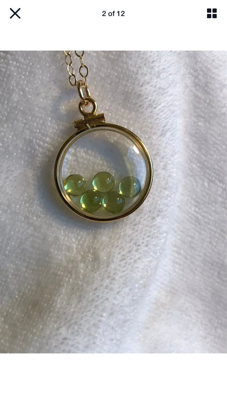 Vintage 12k gold filled locket with five 5mm beautiful green peridot cabochons, 3.26 TCW