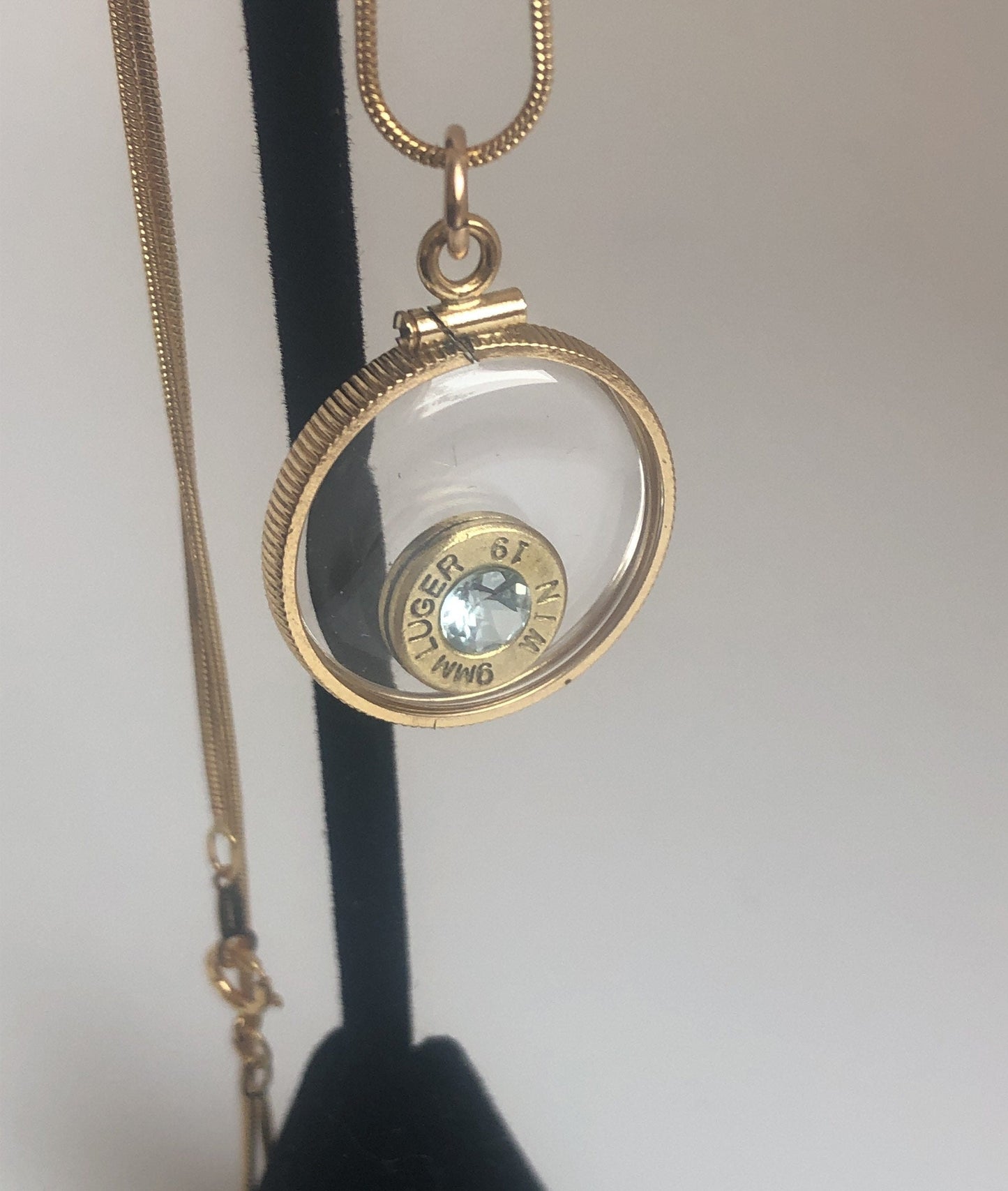 Handmade 9mm bullet w/Aquamarine or tourmaline , back to back view locket, 14k gold filled locket-new with floating faceted gem.