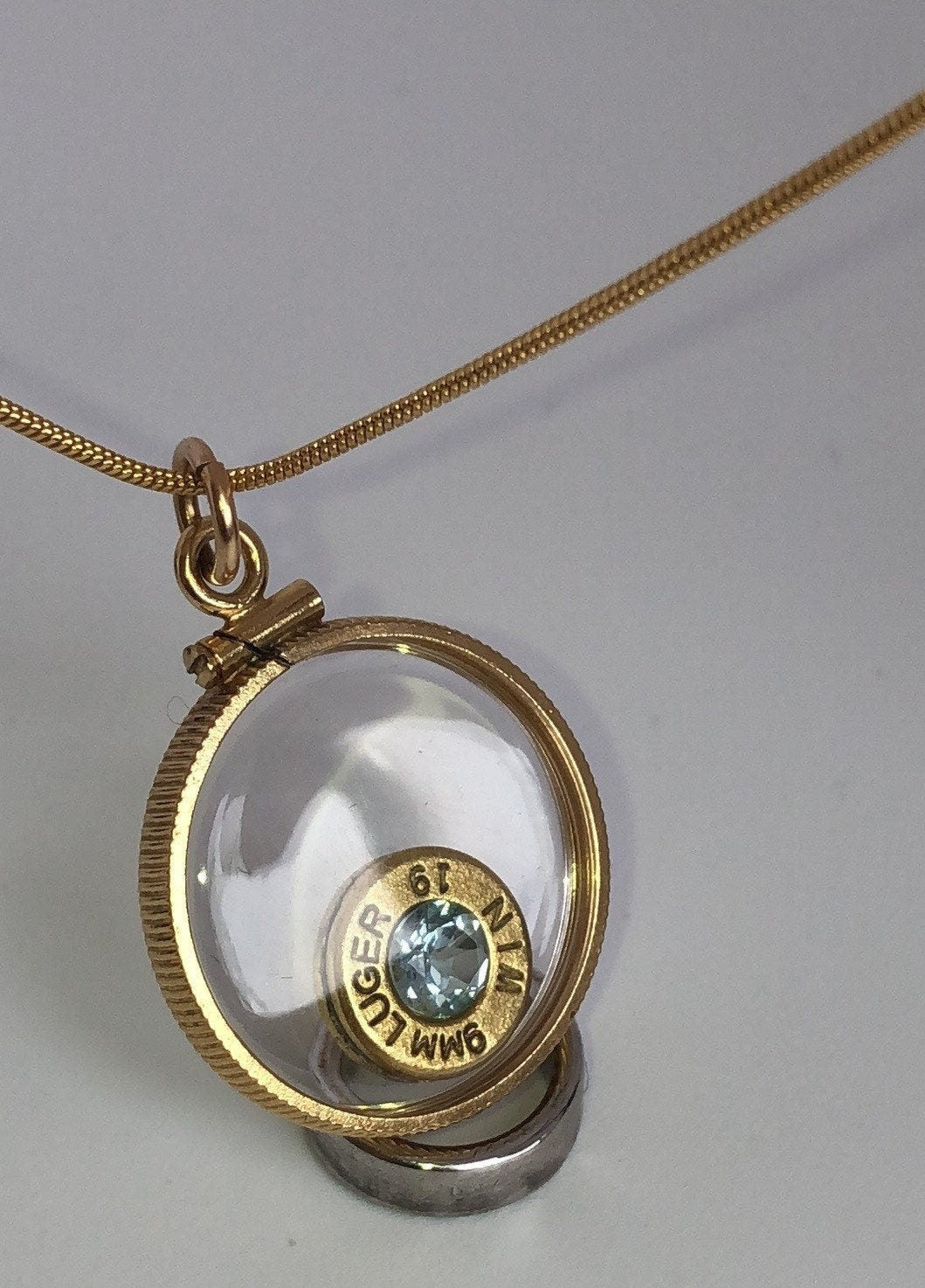 Handmade 9mm bullet w/Aquamarine or tourmaline , back to back view locket, 14k gold filled locket-new with floating faceted gem.