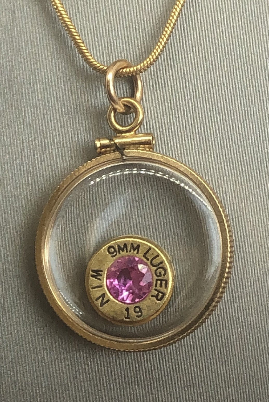 Handmade 9mm bullet w/Aquamarine or tourmaline , back to back view locket, 14k gold filled locket-new with floating faceted gem.